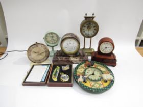 A box of assorted timepieces including interesting year going metal marble effect mantel clock