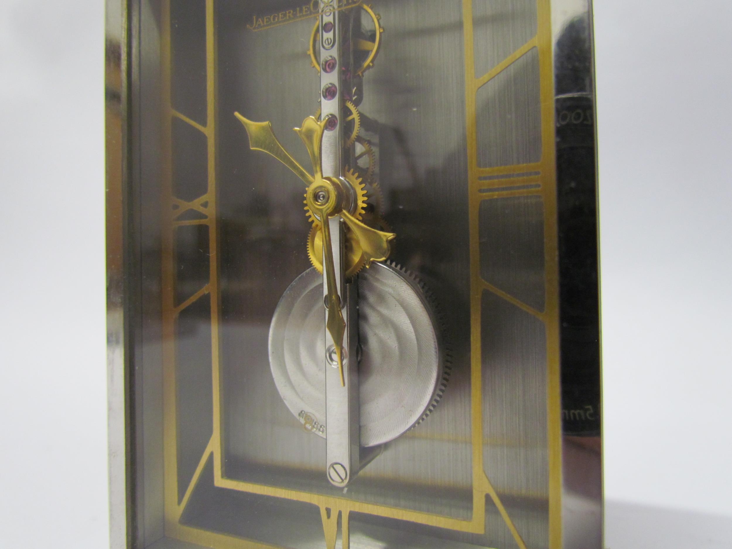 A Jaeger Le Coultre No. 481 mantel clock, visible skeleton movement set with rubies, stainless steel - Image 4 of 5