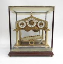 A Congreve Rolling Ball brass clock with our column frame and central zigzag track for the ball,