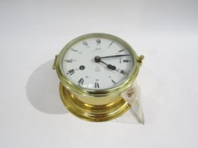 A Schatz royal mariner bulkhead brass clock white dial with Roman numerals and interior 24-hour
