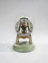 A small onyx base skeleton clock under glass dome, with Roman numeral dial and key, 18cm tall