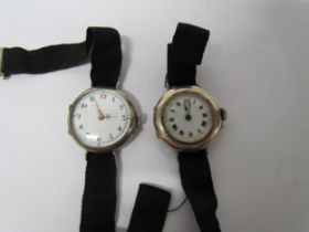 Two early 20th Century silver watches with silk straps one marked 925 date mark for 1916 the other