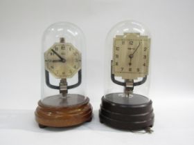 A 20th Century Bulle electric British made anniversary style clock under glass dome, and a Tempex