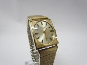 A Longines 10K gold filled rectangular watch with oval face, baton numerical marks, second dial on