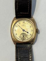 An Omega gentleman's 9ct gold cushion cased wristwatch with Arabic dial, sweep second subsidiary