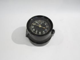 A WWII US navy mark I-boat clock, 1941, housed in bakelite case, No. 10668. No key. 9cm diameter
