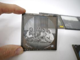 A collection of 22 circa early 20th Century glass photographic slides of India, various