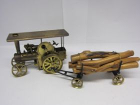 A Wilesco brass live steam traction engine and lumber trailer with log load