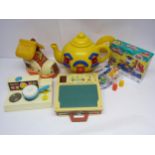 A Bluebird Toys Big Yellow Tea Pot playset, Matchbox Play Boot, Fisher Price cooker and school