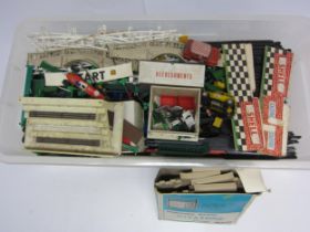A large box of loose and playworn Scalextric track, cars and accessories