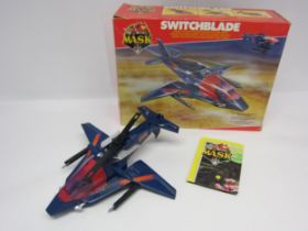A Kenner Mask Switchblade Venom helicopter/aeroplane with action figure, in original box. Includes