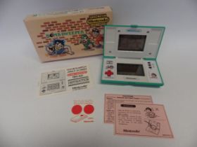 Nintendo Game & Watch Multi Screen Bomb Sweeper handheld electronic game (BD-62) in original box,