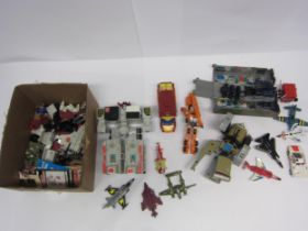 A collection of 1980s Hasbro/Takara Transformers and similar toys, including Bandai, various spares,