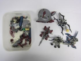 A collection of Tomy Zoids plastic toy and spares