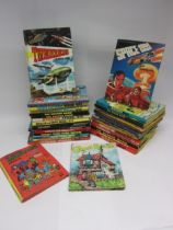 A collection of childrens books and annuals, mostly 1970s and 80s, including Thunderbirds, The