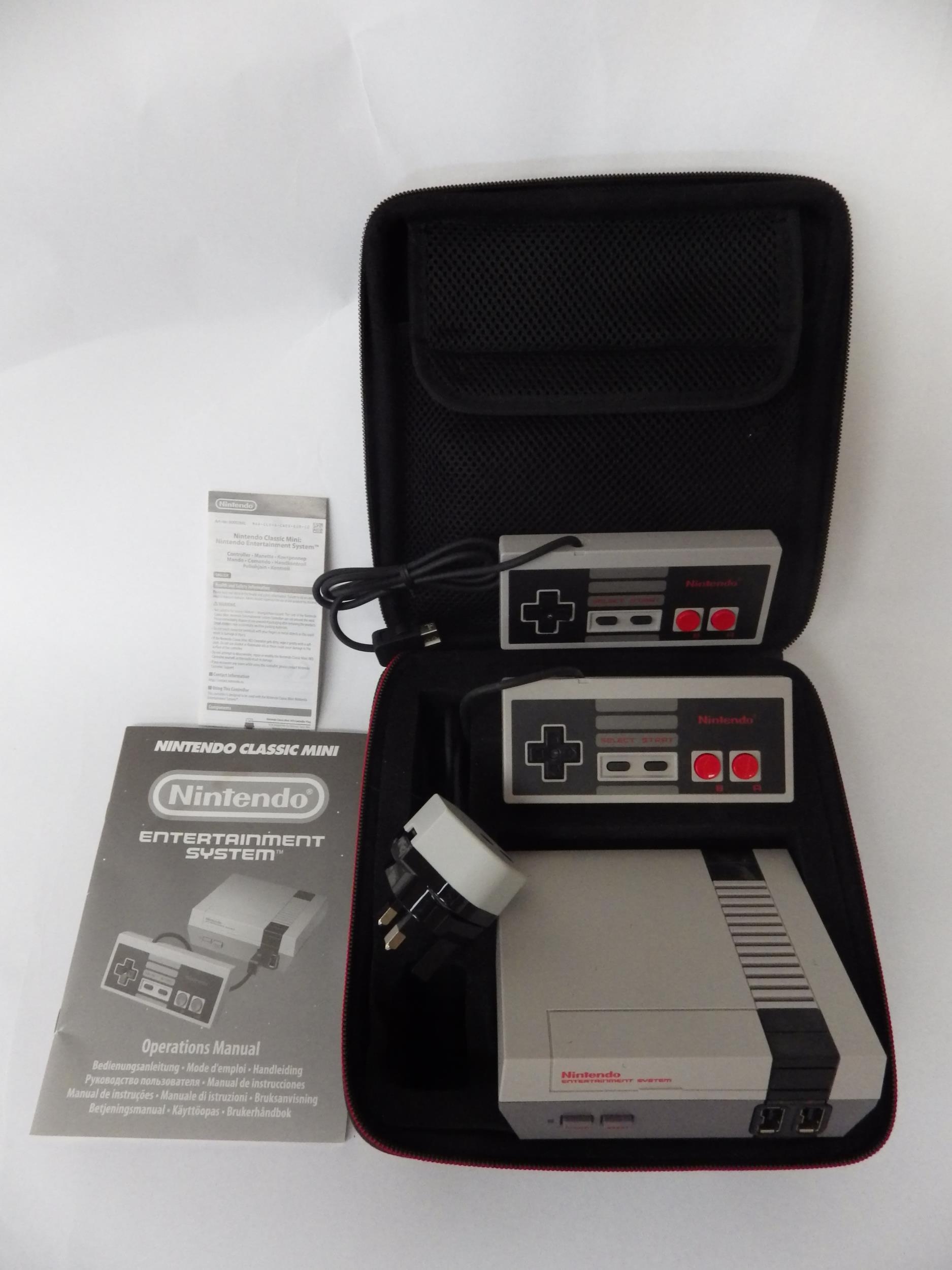 A NES mini containing 30 retro games and two controllers, along with Pac-Man and Frogger TV arcade - Image 2 of 3