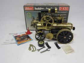 A boxed Wilesco D430 Lokomobile live steam traction engine in black and brass finish