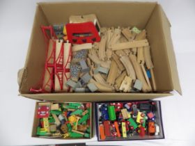 A box of wooden railway tracks including suspension bridges along with two boxes of various wooden