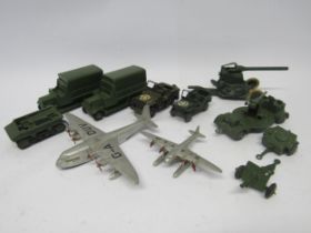 A collection of Dinky Toys military diecast vehicles to include 151b 6-Wheel Covered Wagon (x2),