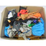A collection of 1990s Action Man figures, vehicles, clothing and accessories