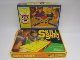 Two 1970s games; Skill Shot Action game and Beat the Black Ball