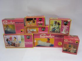 A collection of boxed Pedigree Sindy accessories to include 12SA3 Bed & Bedclothes, 12SA20 Armchair,