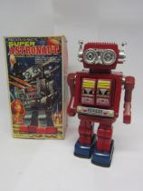 A boxed SH (Horikawa), Japan, battery operated Rotate-O-Matic Super Astronaut tinplate and plastic