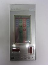A Nintendo Game & Watch Super Color Crab Grab handheld electronic game, model UD-202, serial no.