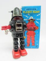 A KO (Yoshiya), Japan, Action Planet Robot, the black tinplate robot with red plastic arms and feet,