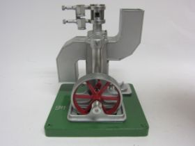 A Ringbom Stirling hot air stationary engine model SR1 with single cylinder, flywheel and metal