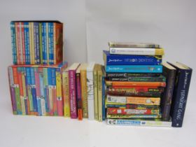 A box of children's books including Roald Dahl, Ben Miller etc