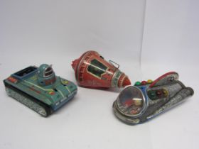 Three unboxed and playworn tinplate space toys to include Modern Toys (Japan) battery operated