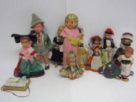 Two early 20th Century celluloid dolls with moulded flapper style hair, together with assorted