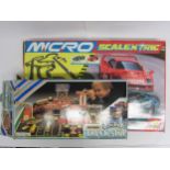 A Micro Scalextric Super Endurance slot racing set and a Matchbox Truck stop play set (2)