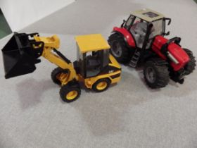 A Bruder Diamond 270 tractor and Cat dozer