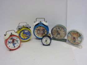 Six assorted novelty and cartoon character alarm clocks to include Woody Woodpecker, Donald Duck (