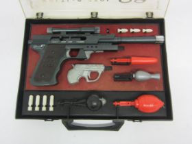 A De Luxe Topper Toys Multi Pistol 09 Secret Agent Set, comprising Multi Pistol 09, mini pistol