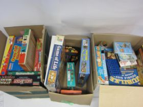 A colelction of mixed board games and jigsaws including Star Wars Monopoly etc (3 boxes)