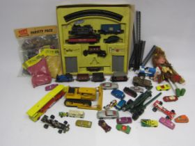 Mixed loose and playworn toys including part boxed Triang 00 gauge train set with additional loose