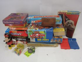 Assorted board games and jigsaws, Minnie Mouse figure, tinplate postbox money box etc