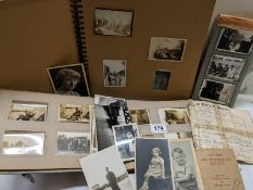 A large quantity of early to mid 20th centry photographs in various albums showing the everyday life