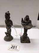 Two oriental bronze figures, 10cm and 12cm.