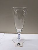 An early stemmed glass with blue twist stem.