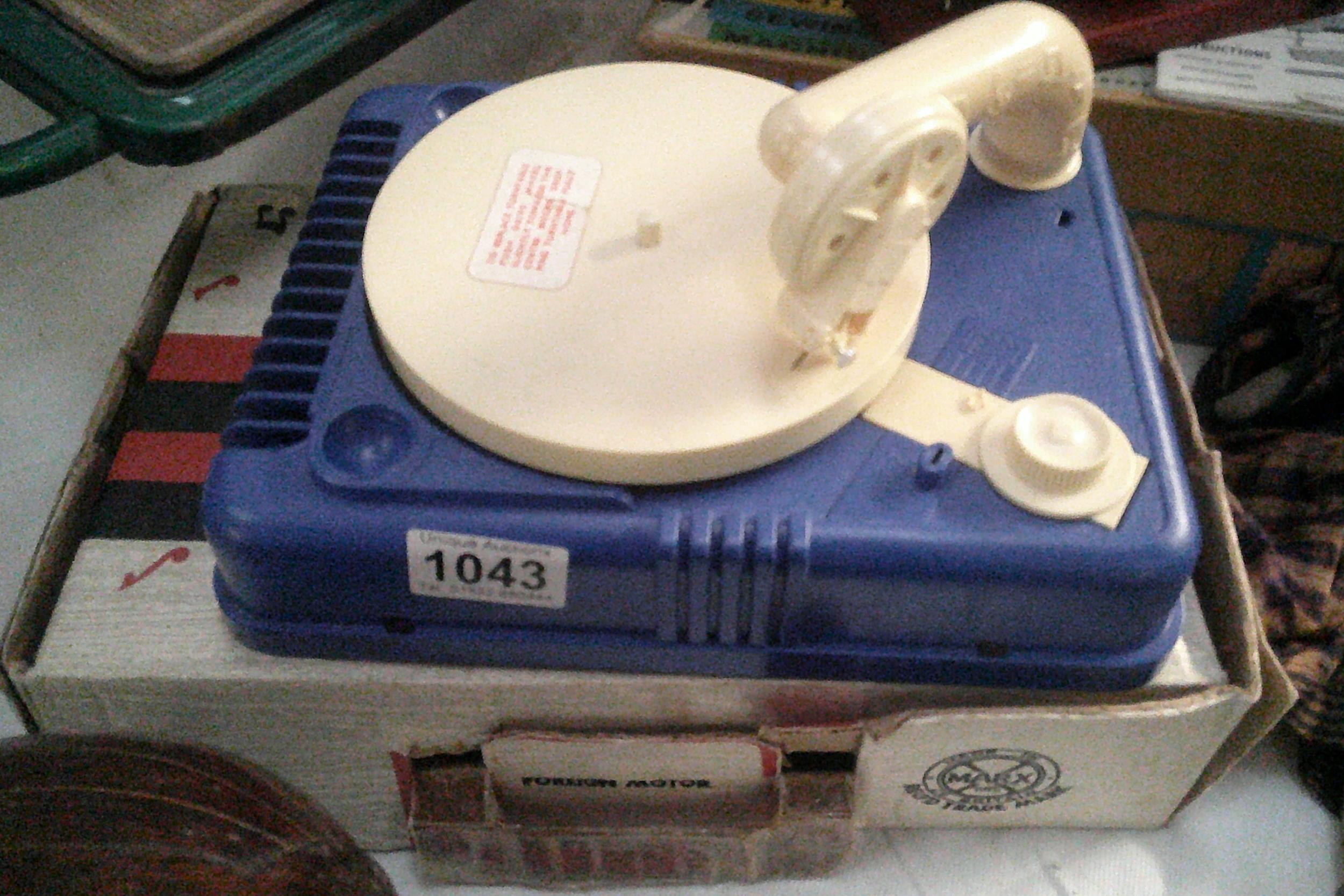 A boxed vintage Lumar battery operated toy gramophone