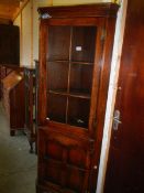 A good quality oak corner cupboard.