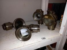 4 early 20th century motorcycle carbide lamps