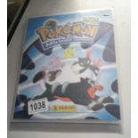 An album of panini Pokemon staks johto league champions