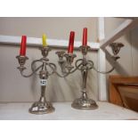 A pair of silver plated candelabra