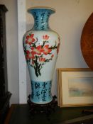 A tall Chinese vase on base. COLLECT ONLY.