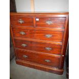 A Victorian mahogany two over three chest of drawers.